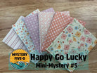 M50 Happy Go Lucky quarter-yard fabric bundle by Bella Rose Quilts for mini mystery quilt event