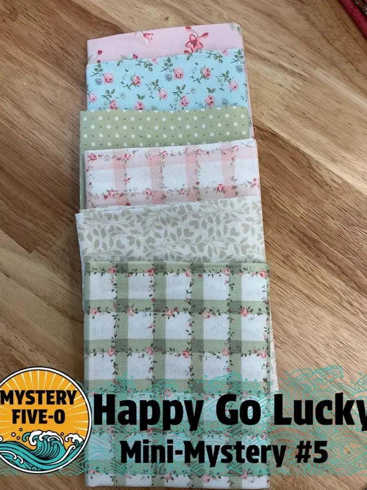 M50 Happy Go Lucky quarter-yard fabric bundle curated by Bella Rose Quilts for mini mystery quilting event