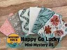 M50 Happy Go Lucky quarter-yard fabric bundle curated by Bella Rose Quilts for mini mystery quilting event