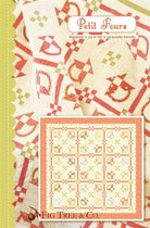 Petit Fours quilt pattern with red and yellow geometric designs by Fig Tree & Co.