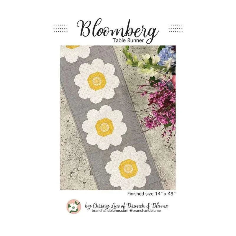 Bloomberg Table Runner Pattern by Chrissy Lux featuring white and yellow flower design on gray background, finished size 14 x 49 inches