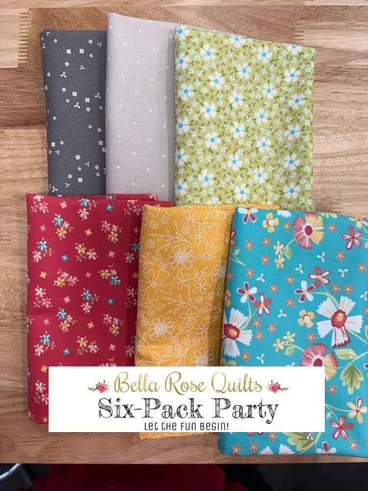 Six vibrant half-yard fabric cuts for Six Pack Bundle quilt project