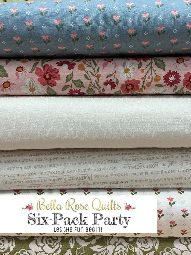 Six colorful fabric half-yard cuts in a Six-Pack Party Bundle for quilting projects