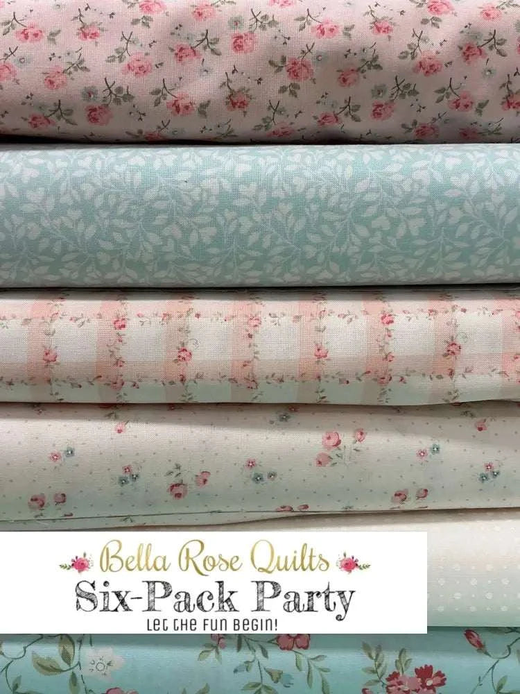 Six colorful fabric half-yard cuts arranged for Six-Pack Party Bundles quilting project