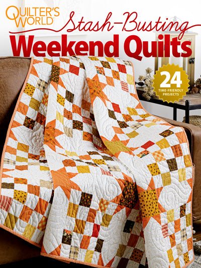 Stash Busting Weekend Quilts magazine cover featuring orange and brown patchwork quilts on a sofa
