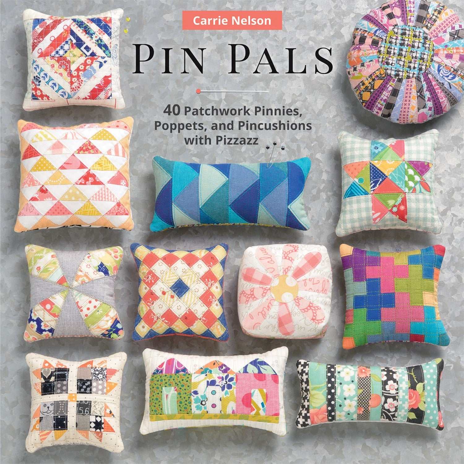 Assorted colorful patchwork pincushions from Pin Pals sewing book by Carrie Nelson