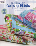 Stack of colorful, quick and easy quilts for kids with playful patterns and bright colors