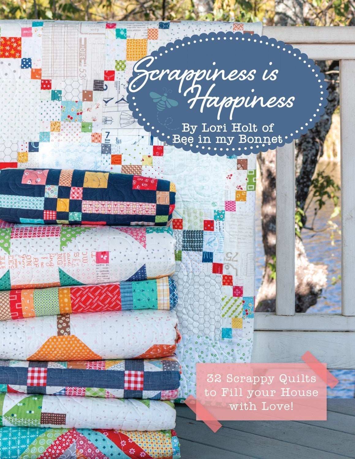 Scrappiness is Happiness quilt book by Lori Holt featuring colorful scrappy quilts and fabric stash organization tips