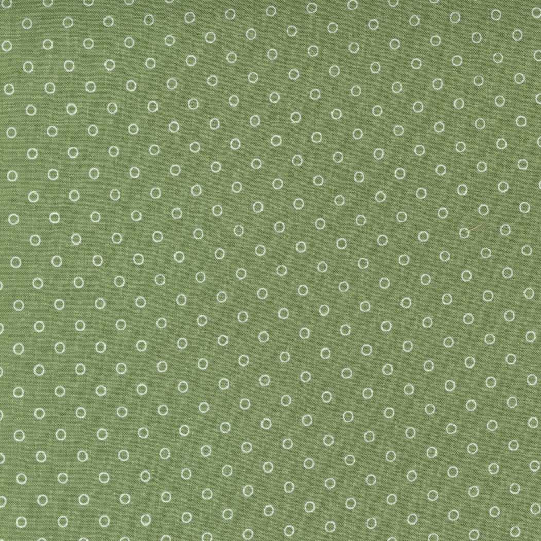 Green fabric with small white dotted circles pattern from Nantucket Summer collection by Camille Rosekelley for Moda