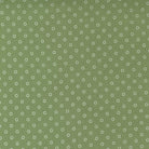 Green fabric with small white dotted circles pattern from Nantucket Summer collection by Camille Rosekelley for Moda