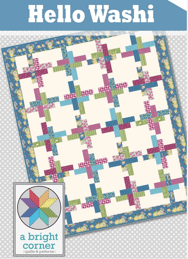 Hello Washi quilt pattern by A Bright Corner featuring colorful patchwork design and floral borders